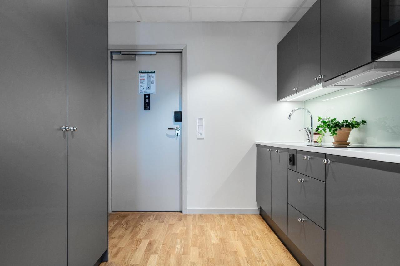Biz Apartment Bromma Stockholm Luaran gambar A typical kitchen in a student apartment